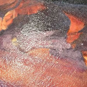 Irregular paint gloss on oil paint and varnish